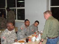 Sen. Jim Inhofe (R-Okla.), ranking member of the Senate Armed Services Committee (SASC), shares dinner with U.S. Army soldiers stationed in Lithuania on Oct. 27, 2014